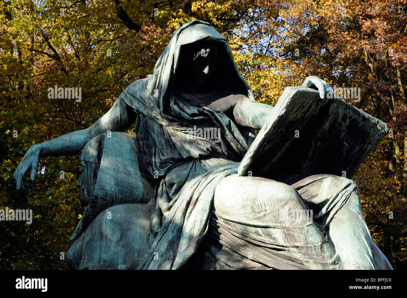 The Bismarck Memorial, Tiergarten, Berlin. Below Bismarck is a sibyl reclining on a sphinx and reading the book of history. Stock Photo