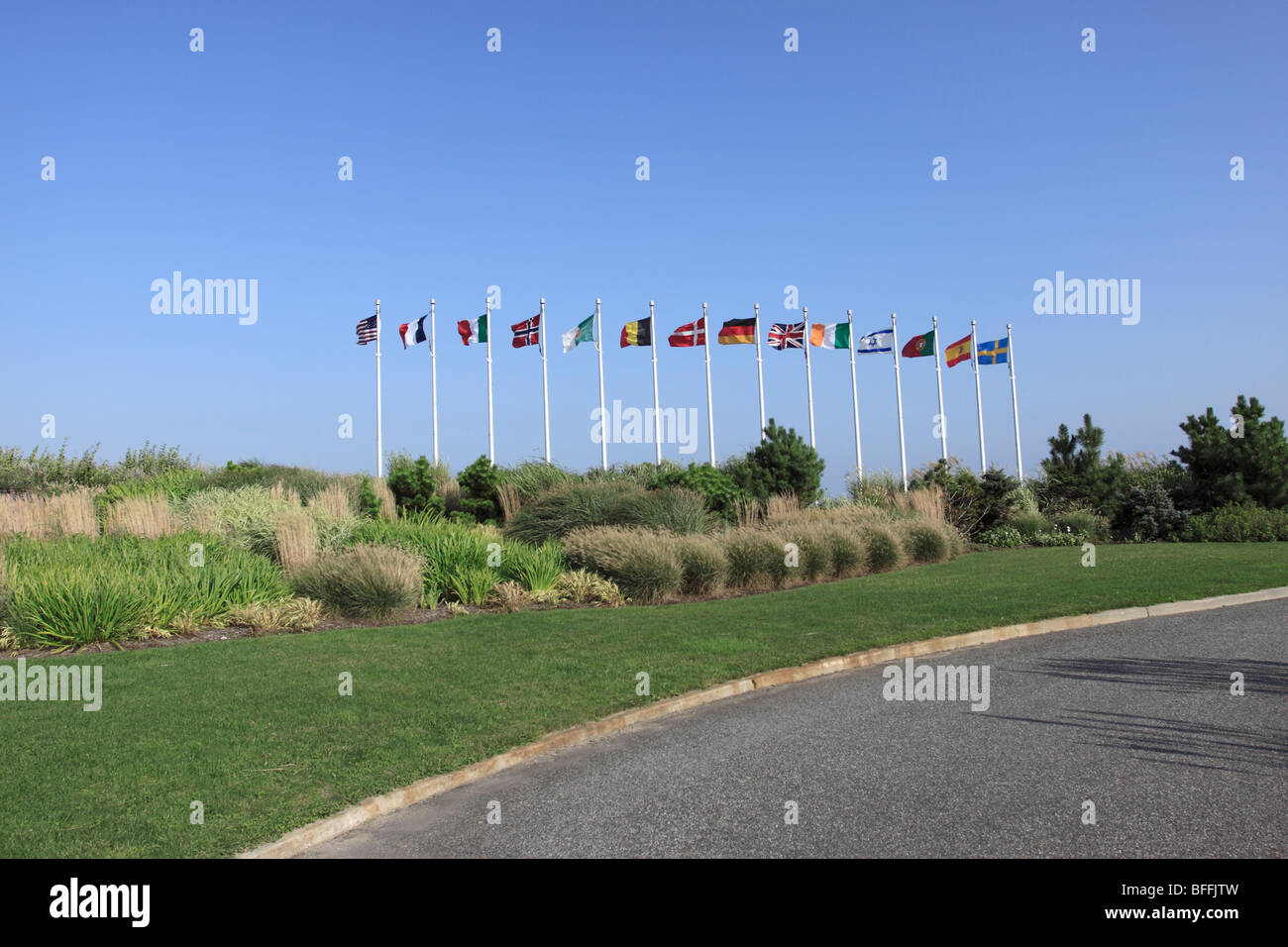 Flags of countries that lost citizens in crash of TWA Flight 800 at the memorial site, Smith Point Beach, Long Island, NY Stock Photo