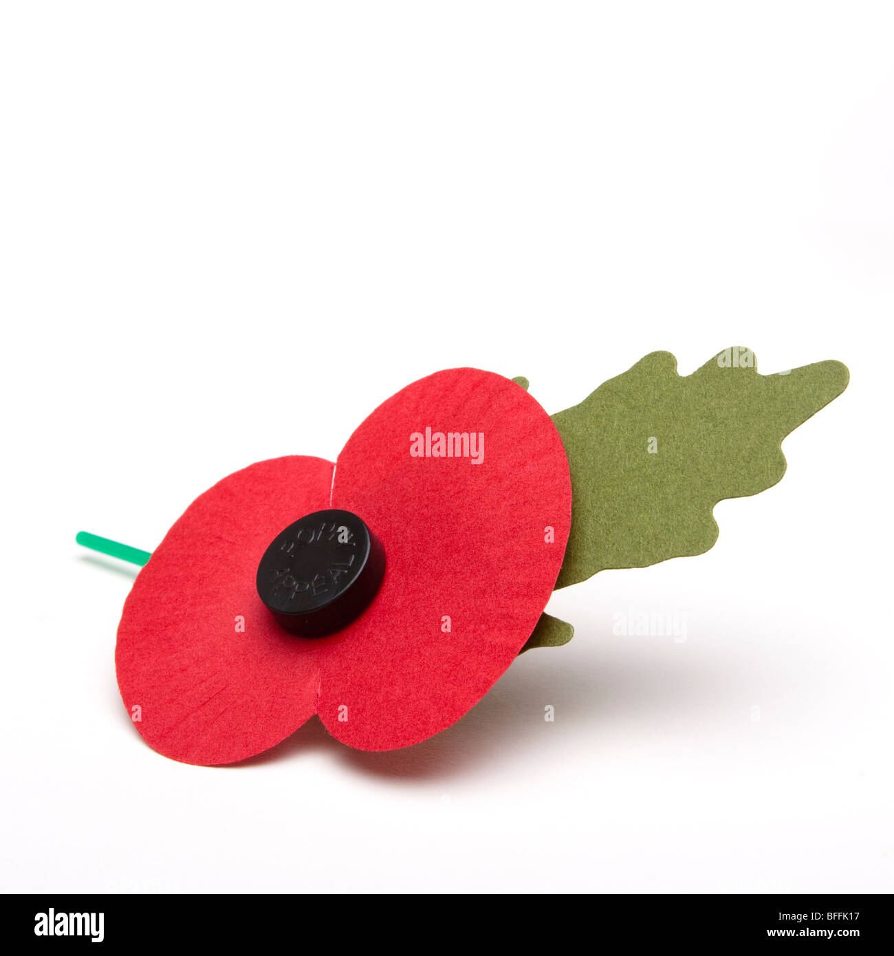 Single artificial poppy day appeal poppy isolated against white background. Stock Photo
