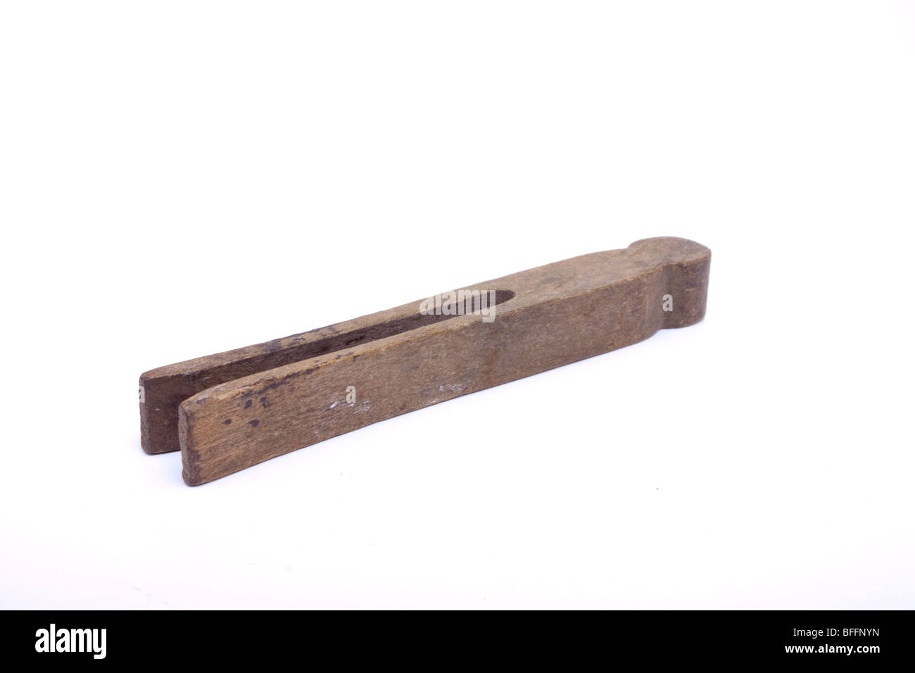 Edwardian English clothes peg isolated against white background Stock