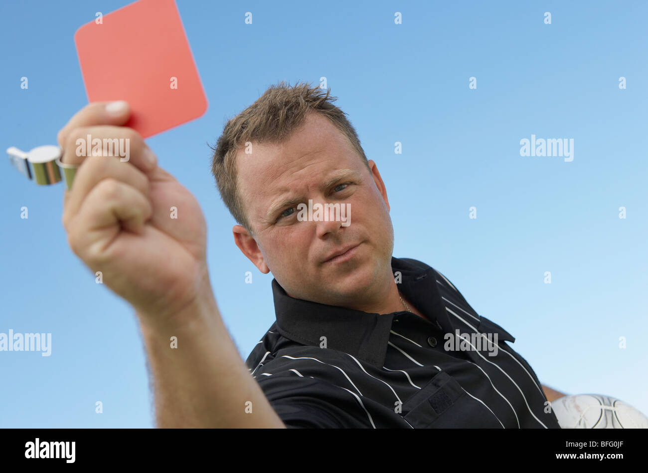 Soccer Referee Showing Red Card Stock Photo