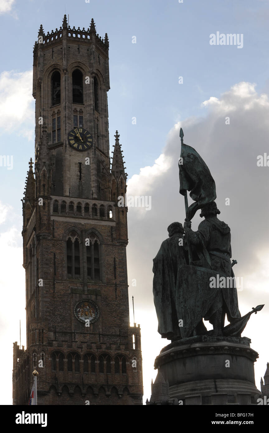Statue of Pieter de Coninck and Jan Breidel and the Bell Tower Bruges in Belgium Europe Stock Photo