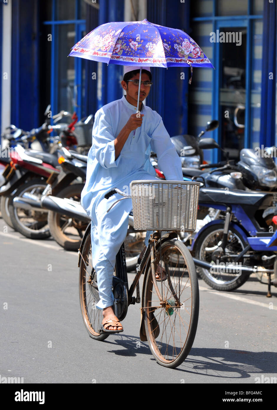 Man riding a bicycle, Sri Lanka Stock Photo