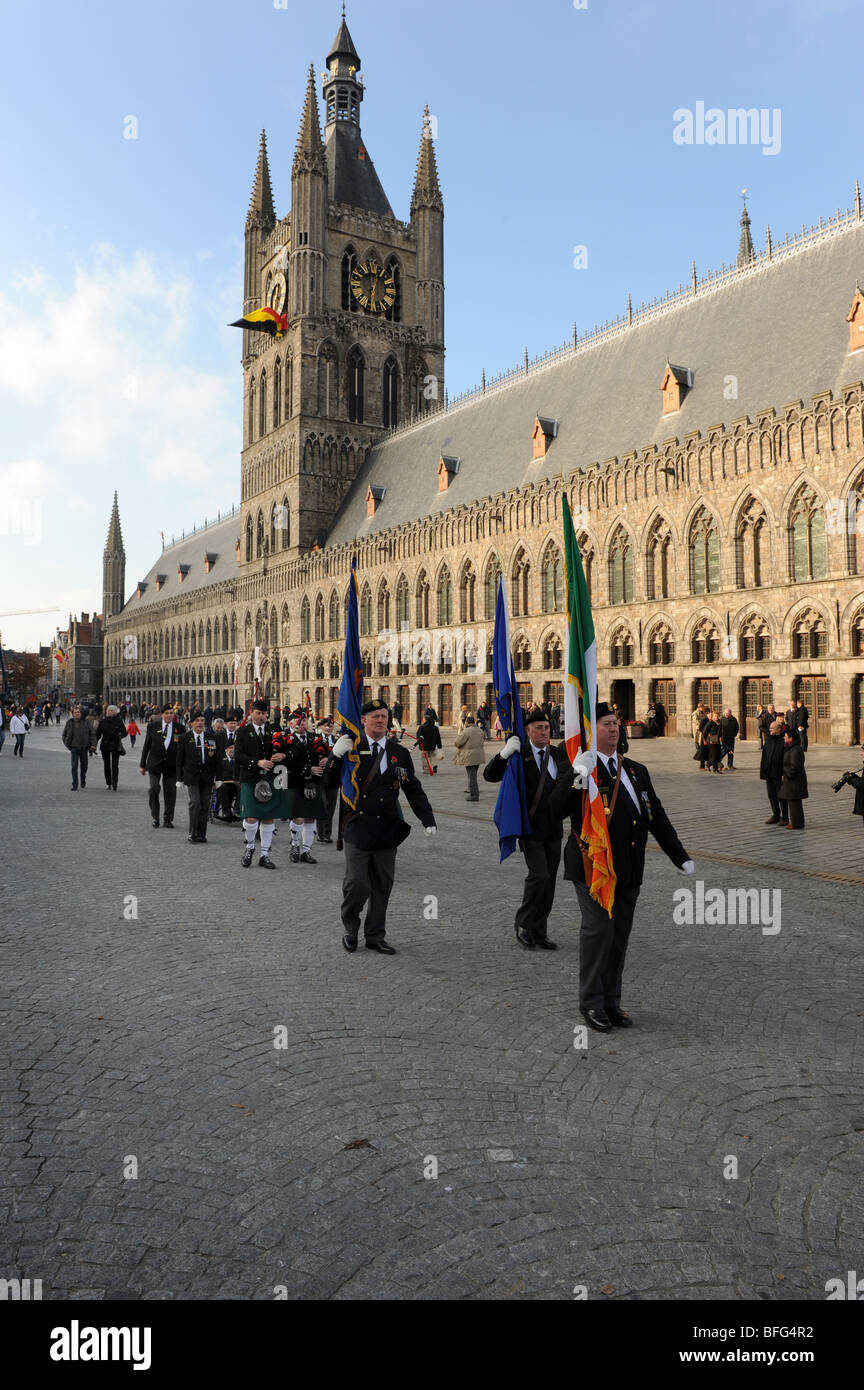 Ex servicemen marching from The Cloth Hall and Grote Markt at Ypres now called Leper in Flanders Belgium Stock Photo