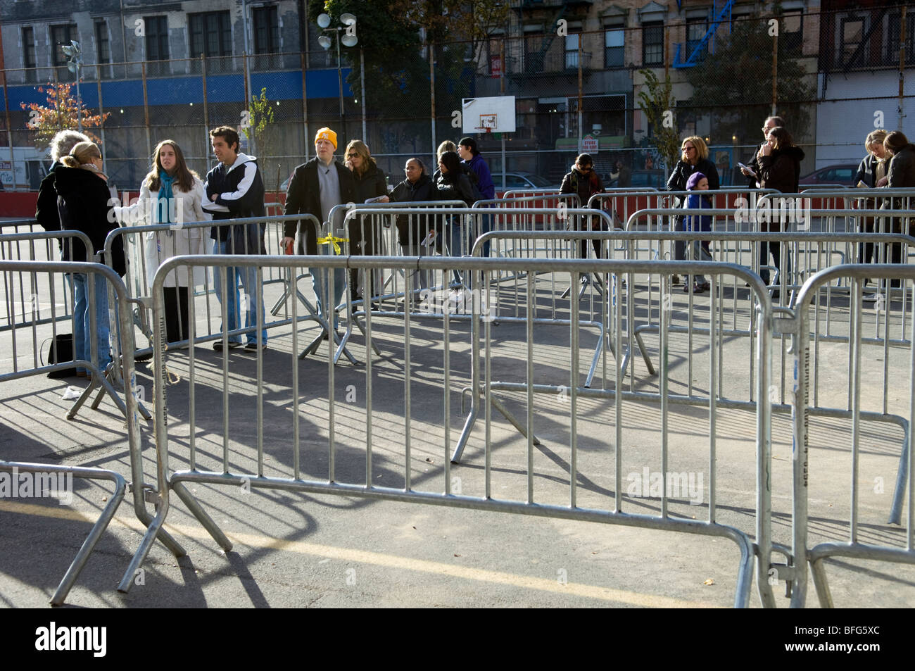 Children accompanied by parents and guardians line up to receive the free H1N1 influenza vaccine Stock Photo