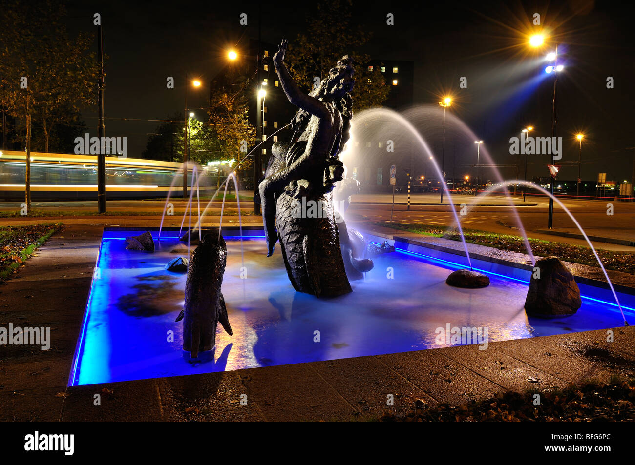 A fountain at night with time exposure Stock Photo - Alamy