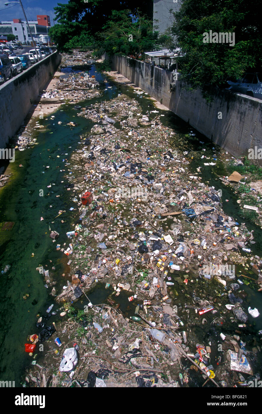 garbage, trash, raw sewage, unsanitary water, polluted water, polluted waterway, pollution, Montego Bay, Jamaica Stock Photo