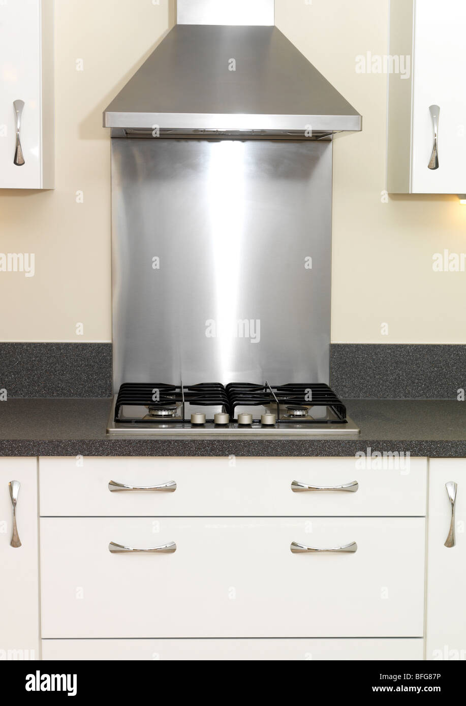 Gas Hob and Stainless Extraxtor Hood Luxury Flat Interior Kitchen Stock