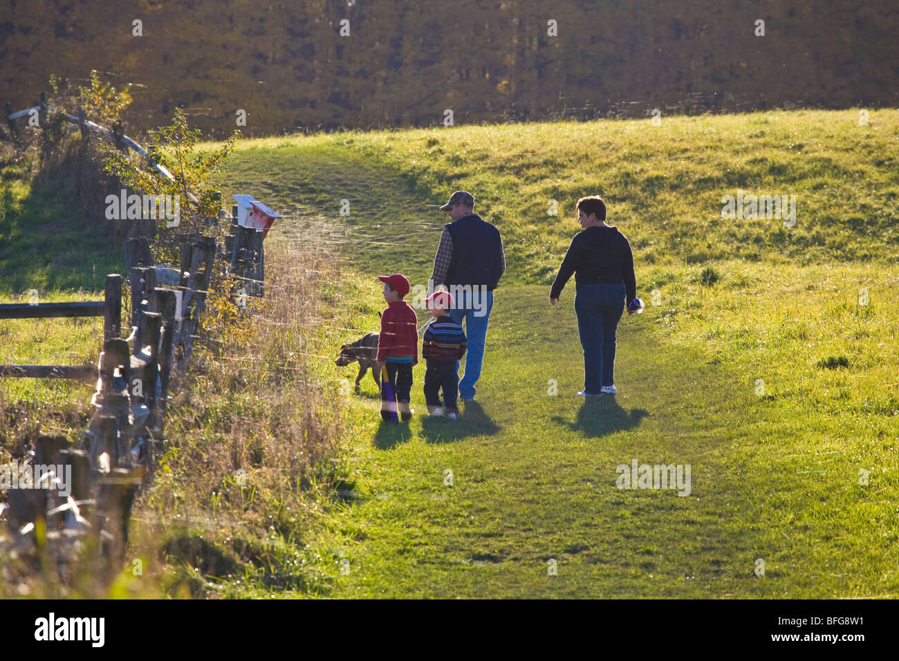 Family with dog walking in Knox Farm State Park in East Aurora New York