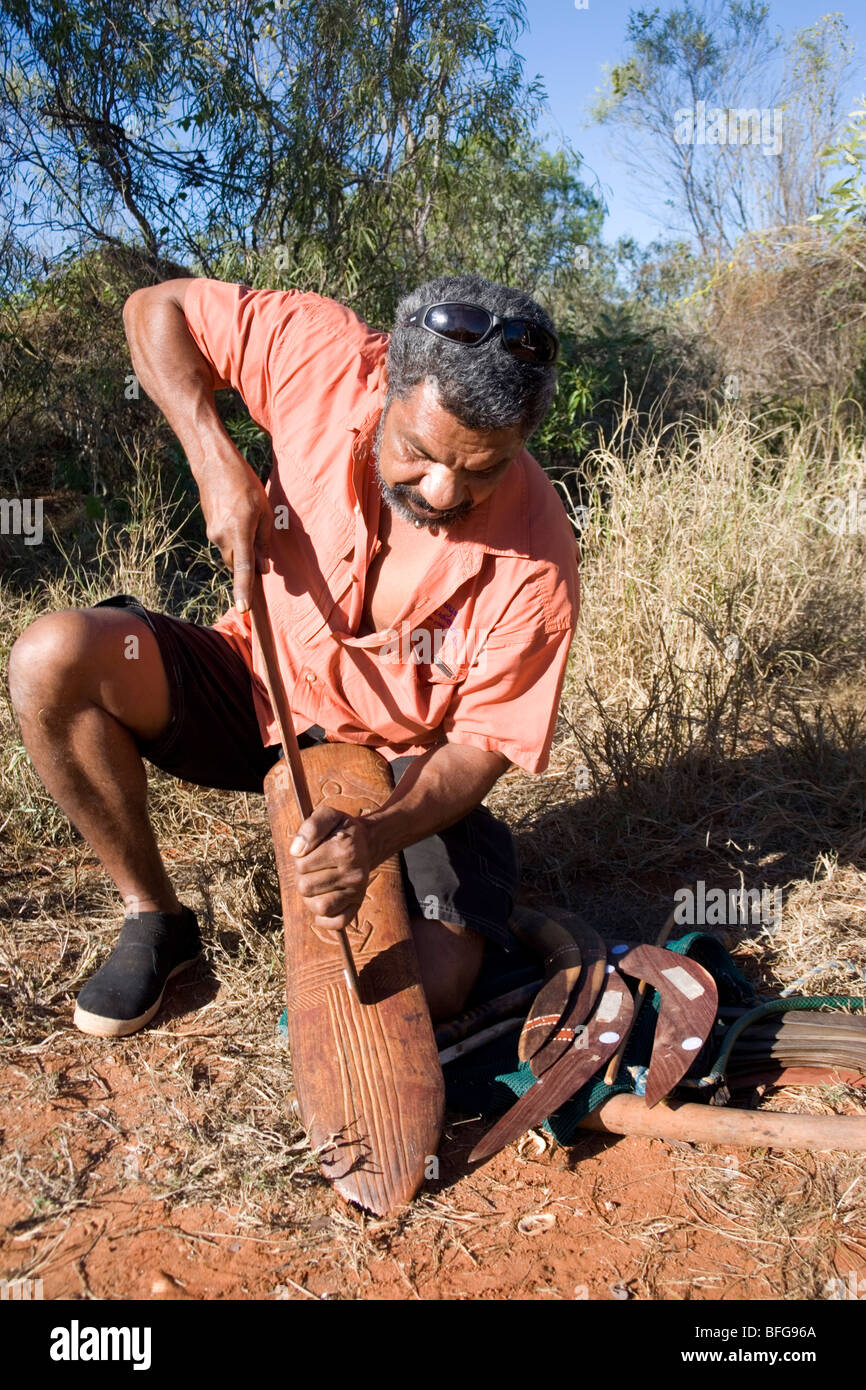 Neville Poelina, Indigenous tour guide in Broome Western Australia demonstrating his equipment Stock Photo