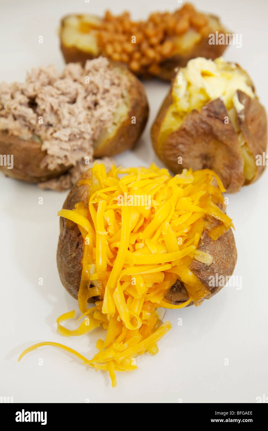 Assortment of Jacket Potatoes and fillings Stock Photo Alamy