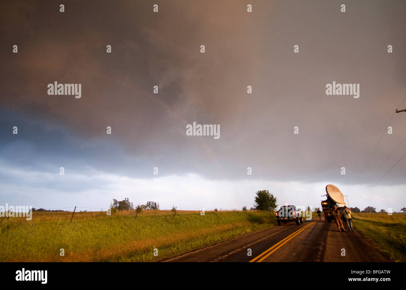 A doppler radar truck parked alongside the road in northwestern