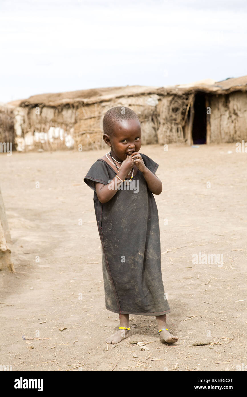African Maasai child sneaking a look at the camera Stock Photo - Alamy