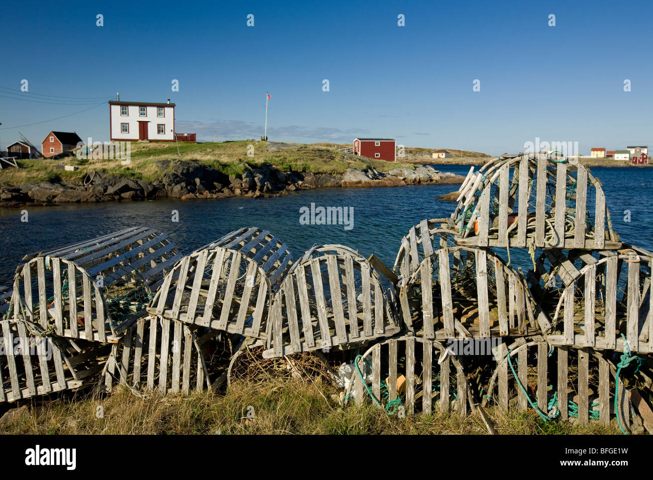 lobster traps and traditional saltbox house in the village of Tilting