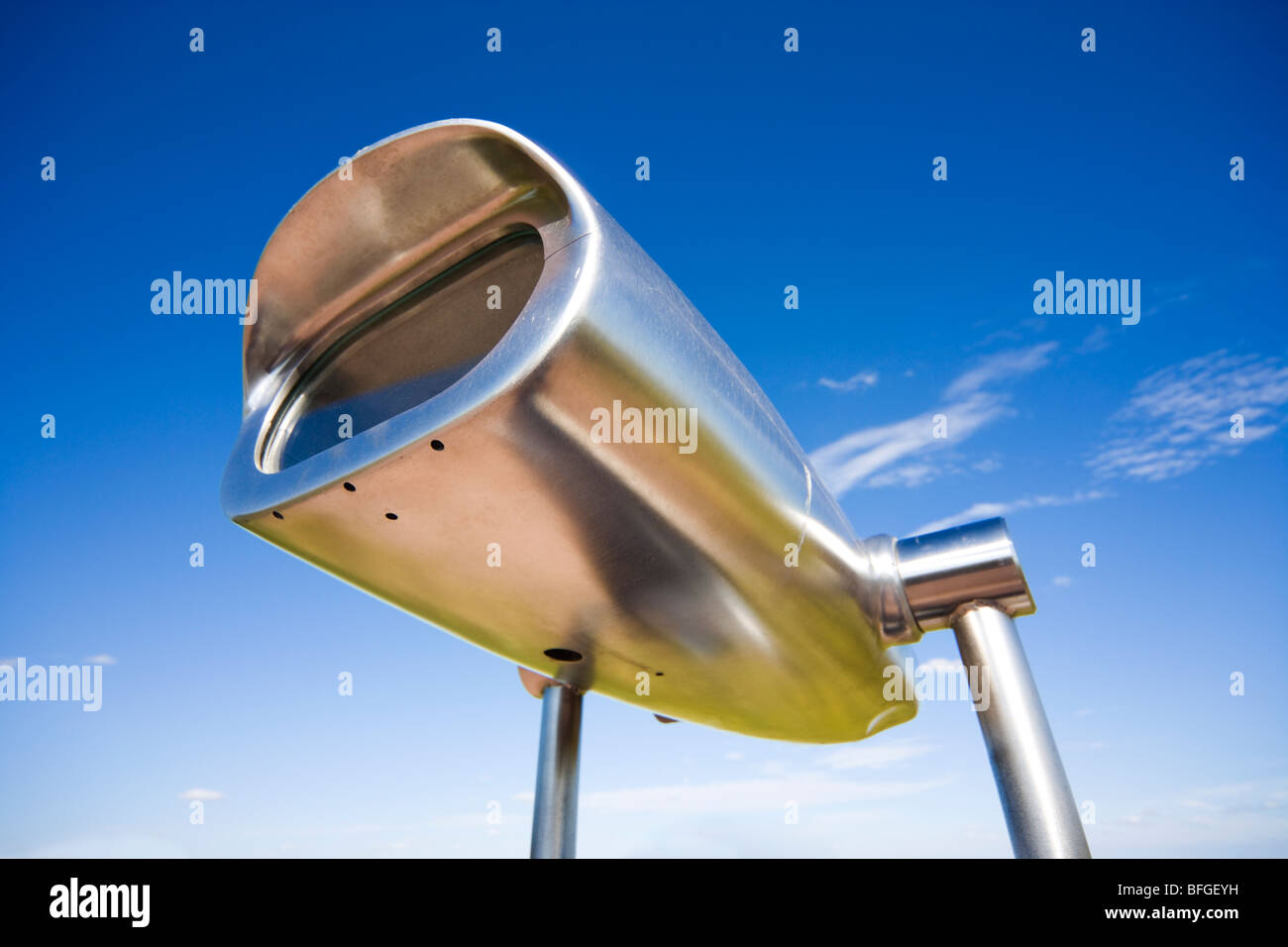 Strong big steel aluminum viewing scopes. Binoculars Hi-Spy coin operated. Mechanical 50X Telescope Viewer on a stand, pedestal. Stock Photo