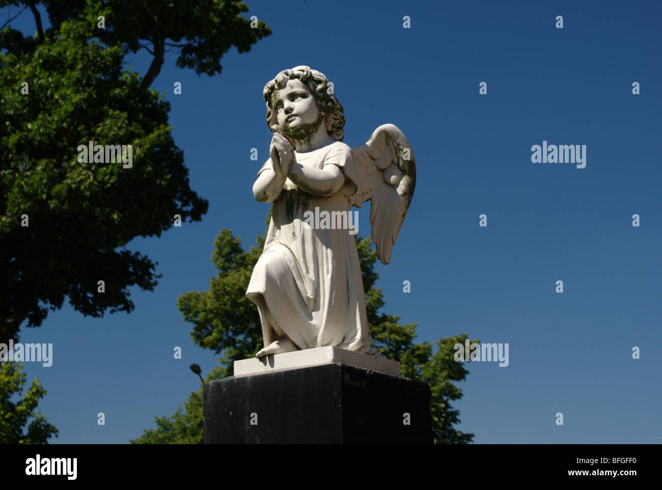 Cherub prayer Stock Photo