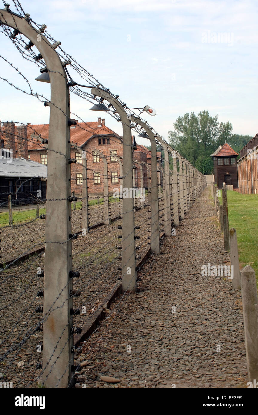 Auschwitz - Birkenau former German  WW2 Concentration Camp electrified barbed wire fence Stock Photo
