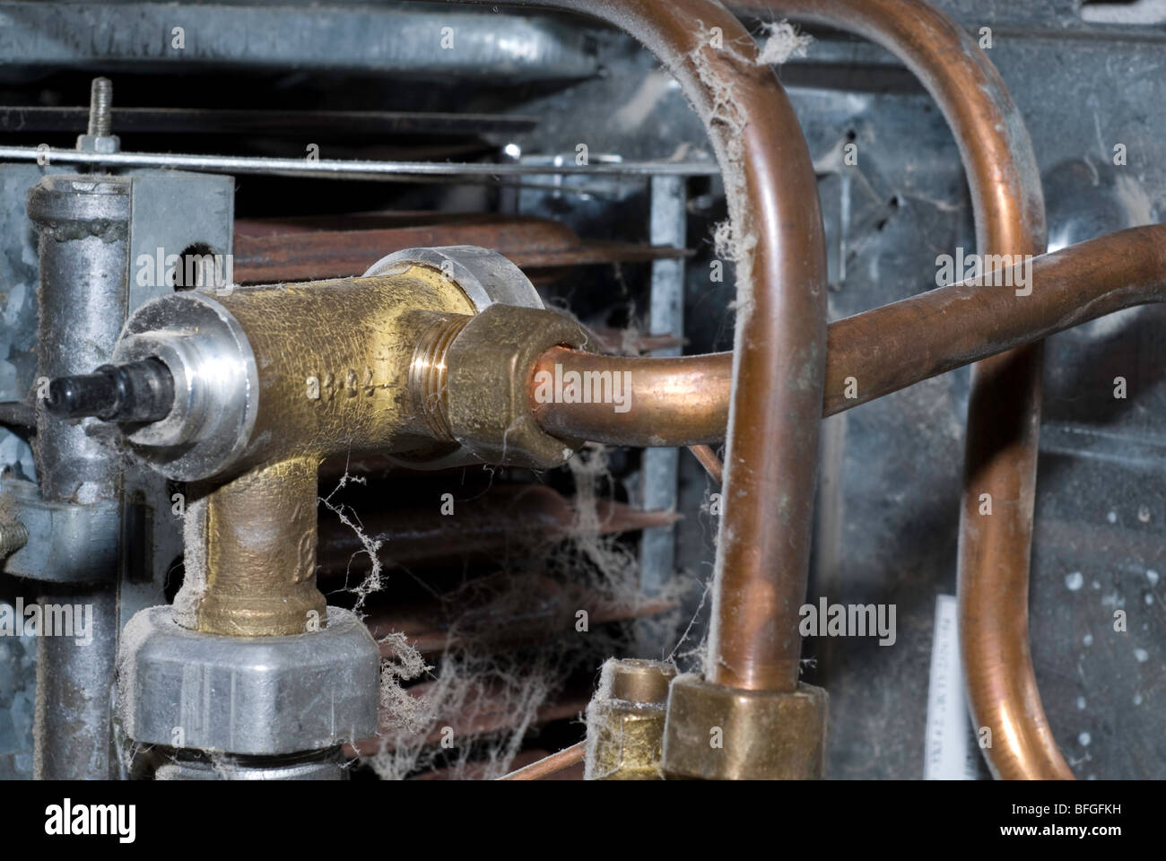 old dusty gas water heater, inside view Stock Photo