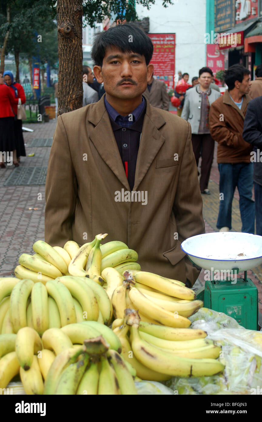Uyghur People In The Street Markets Of Urumqi Xinjiang China
