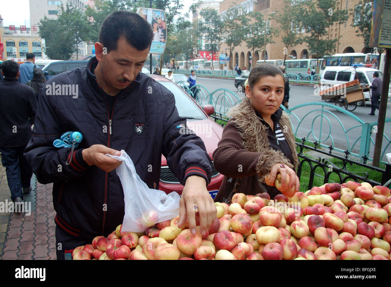 Uyghur people in the street markets of Urumqi, Xinjiang, CHINA Stock Photo