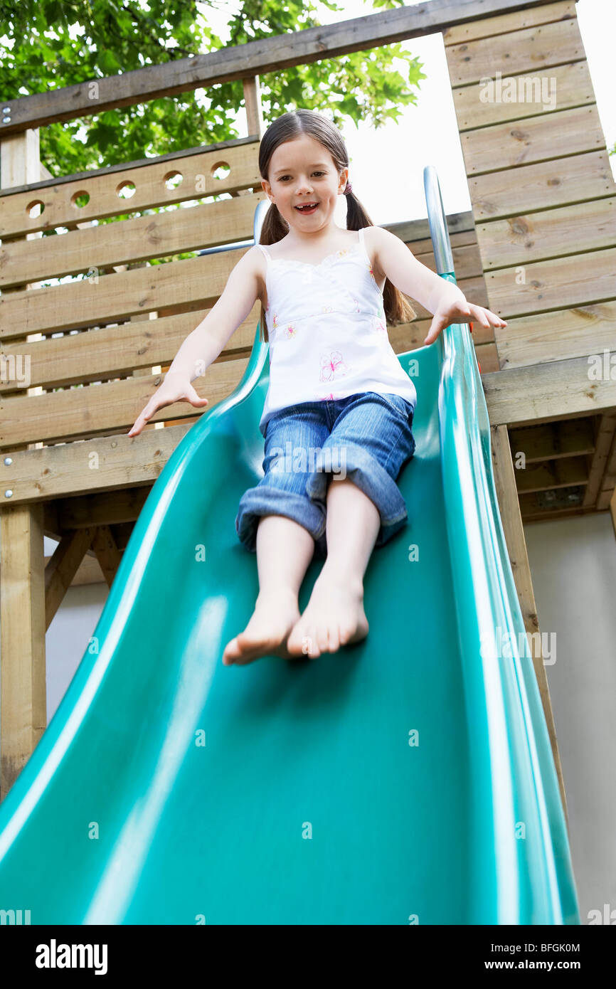 Little going down slide Stock Photo - Alamy