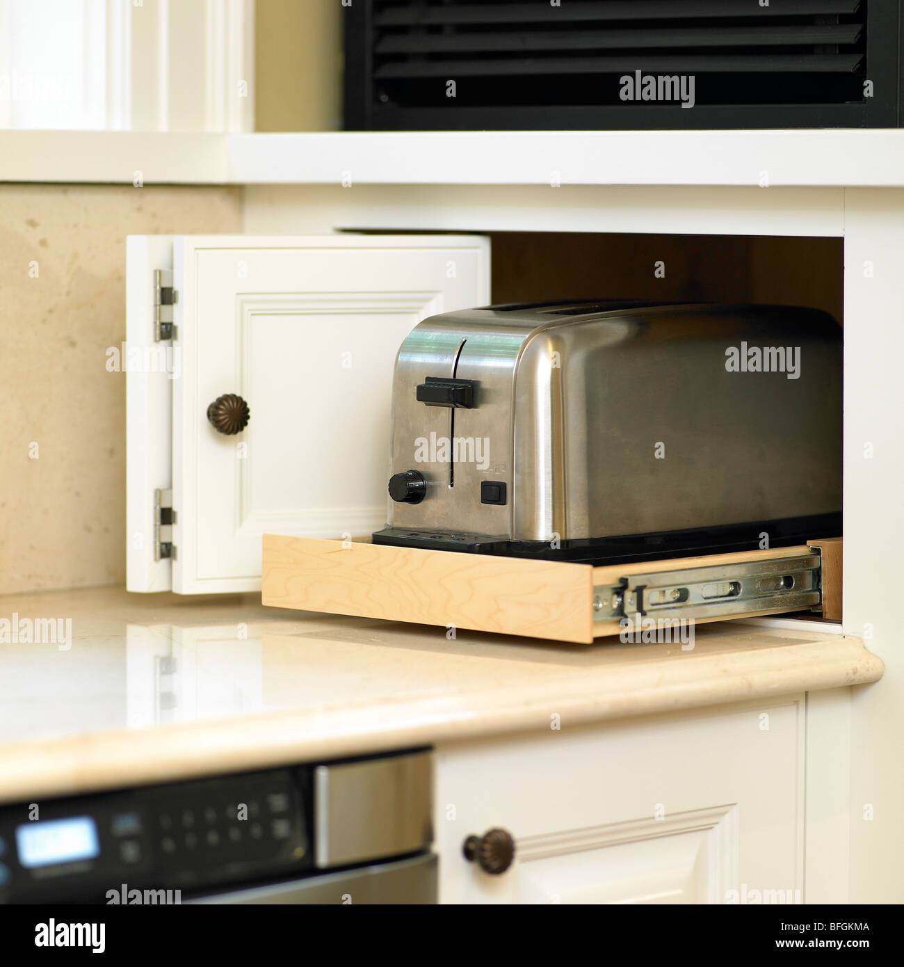 Toaster on a counter pull out tray Stock Photo Alamy