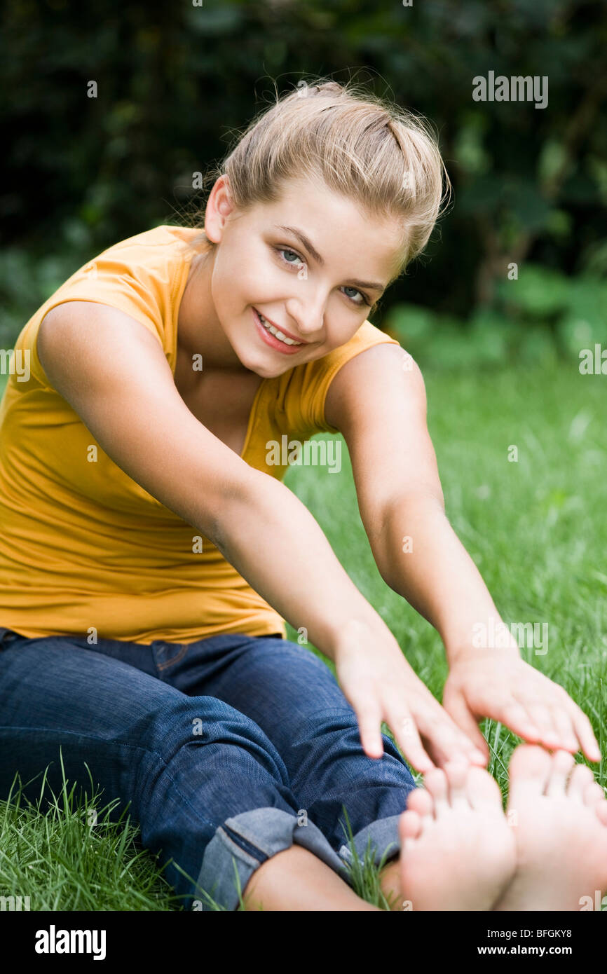 young woman exercising in park Stock Photo - Alamy