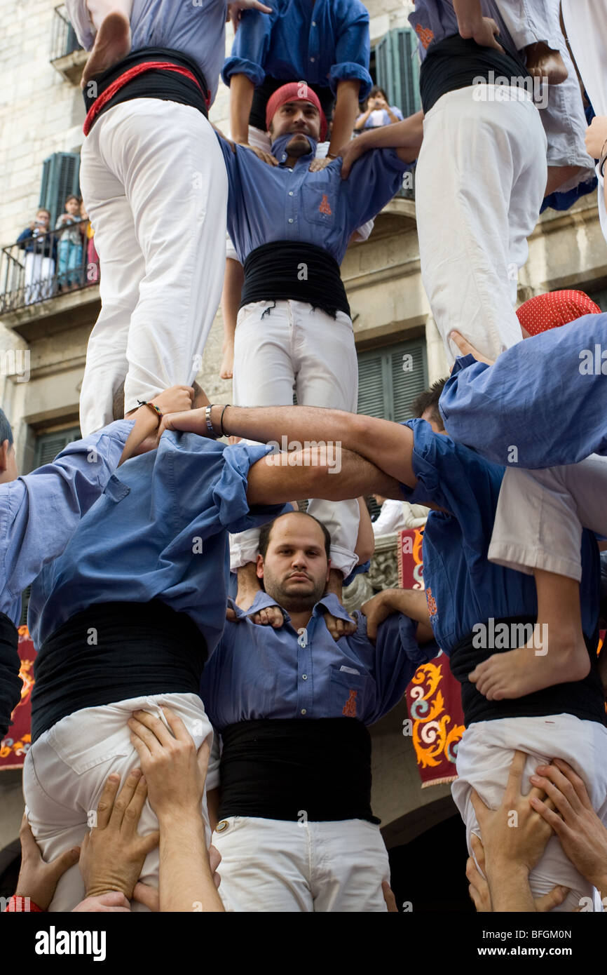 Human tower called Castell in Girona, Catalonia, Spain Stock Photo