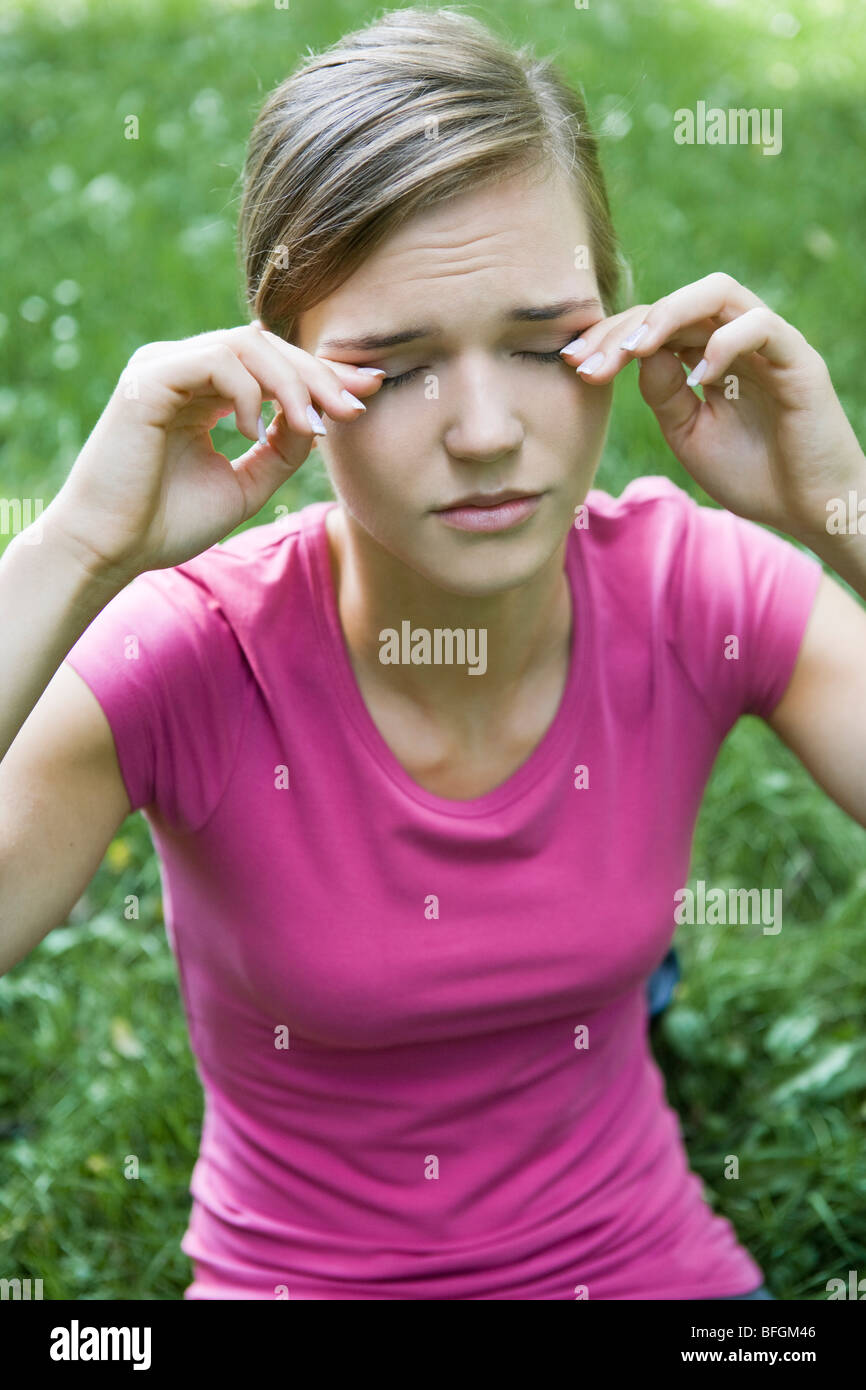 woman rubbing eyes Stock Photo Alamy