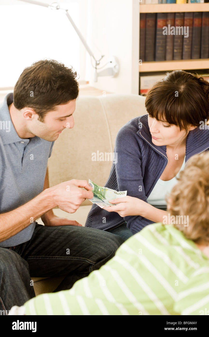 parents talking about money Stock Photo