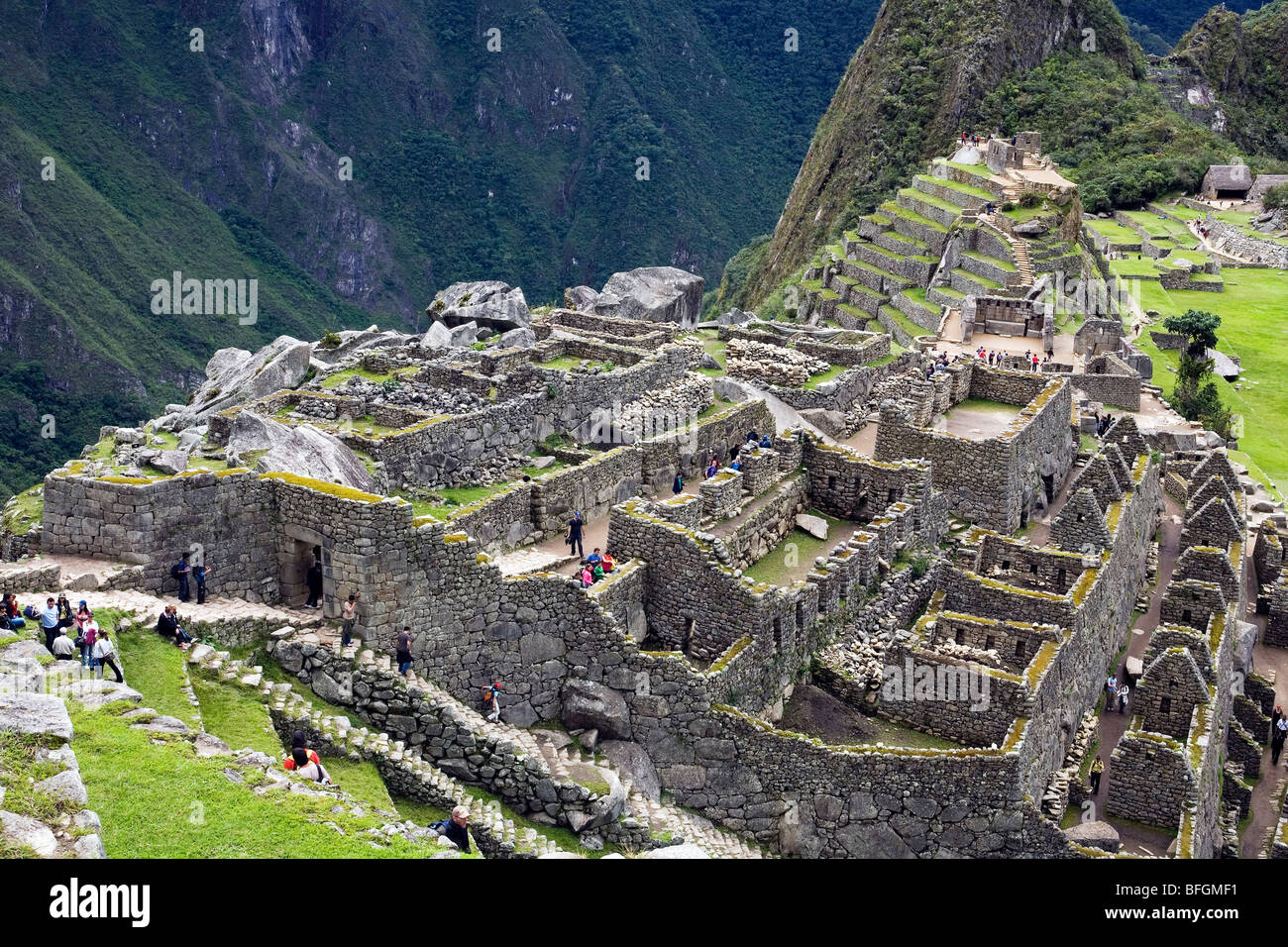 Tourists at Inca's city of Machu Pichu, UNESCO site, Urubamba province, Peru Stock Photo