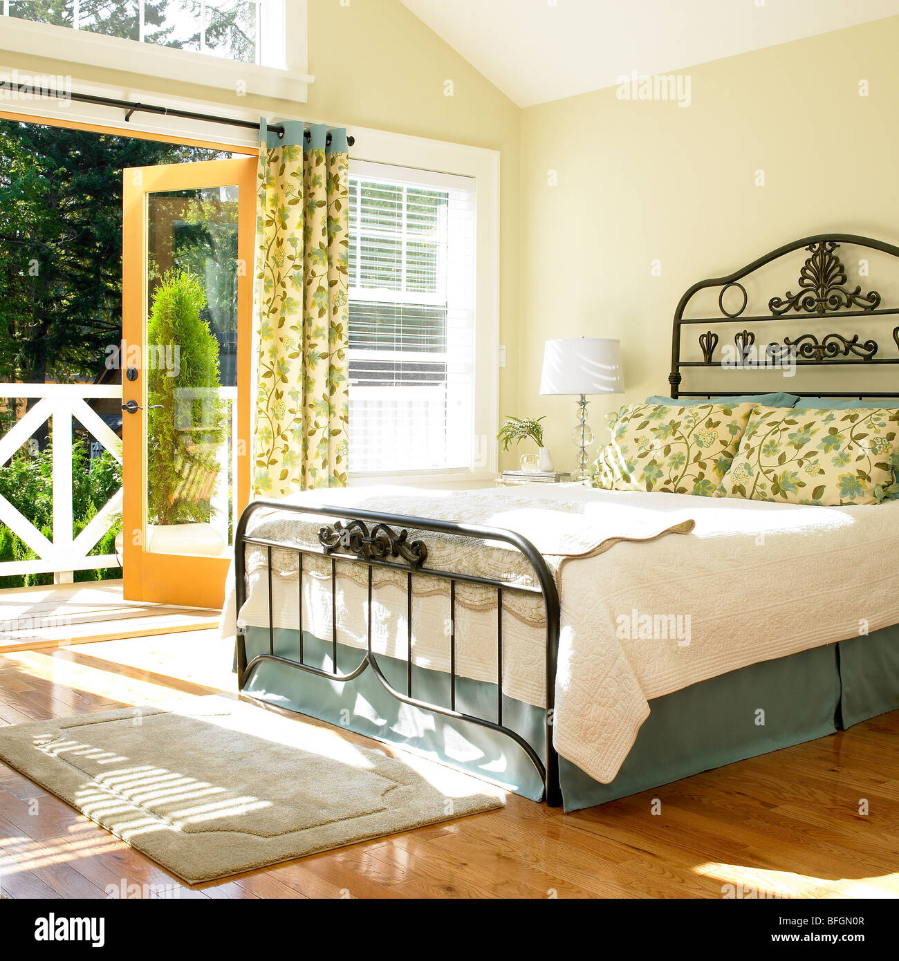 Sunny Bedroom With Doors Open To Deck Victoria British