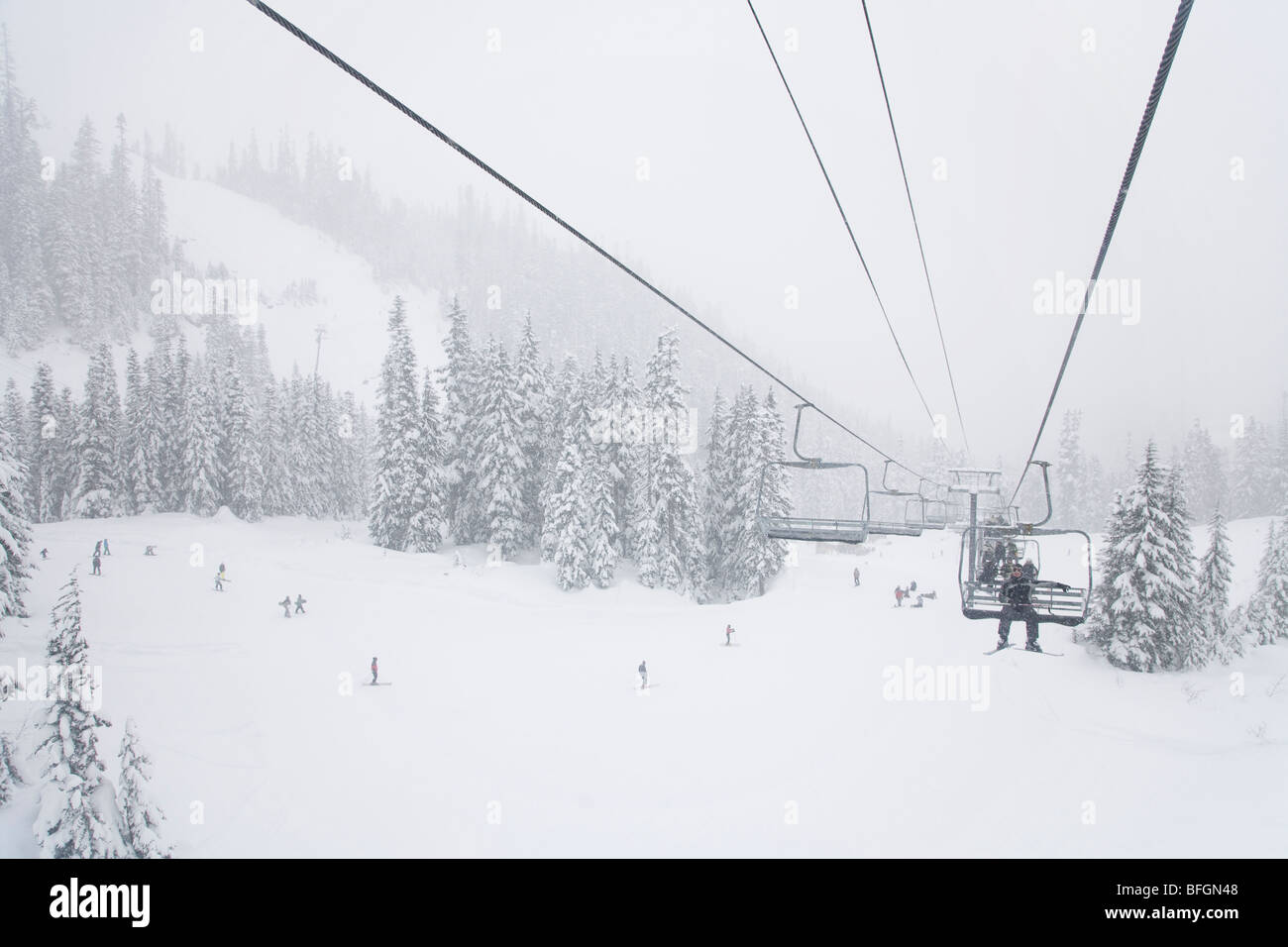 Person on ski lift, Mount Baker, Washington Stock Photo