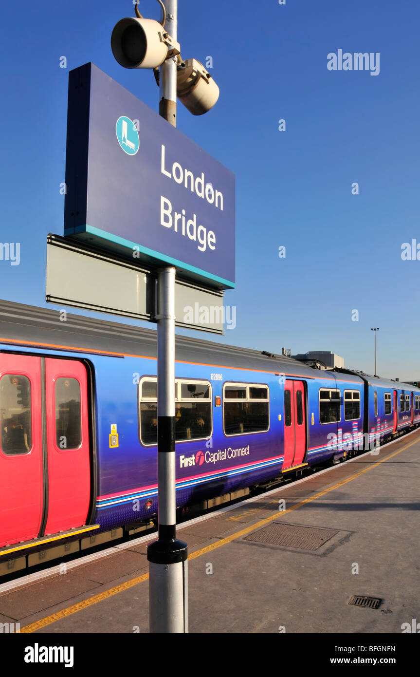 London Bridge railway station sign &  train Stock Photo