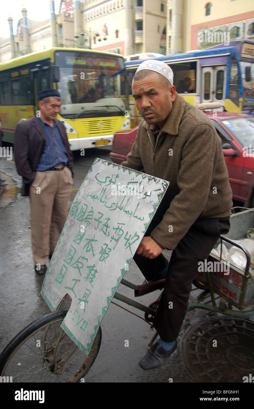 Uyghur people in the street markets of Urumqi, Xinjiang, CHINA Stock Photo