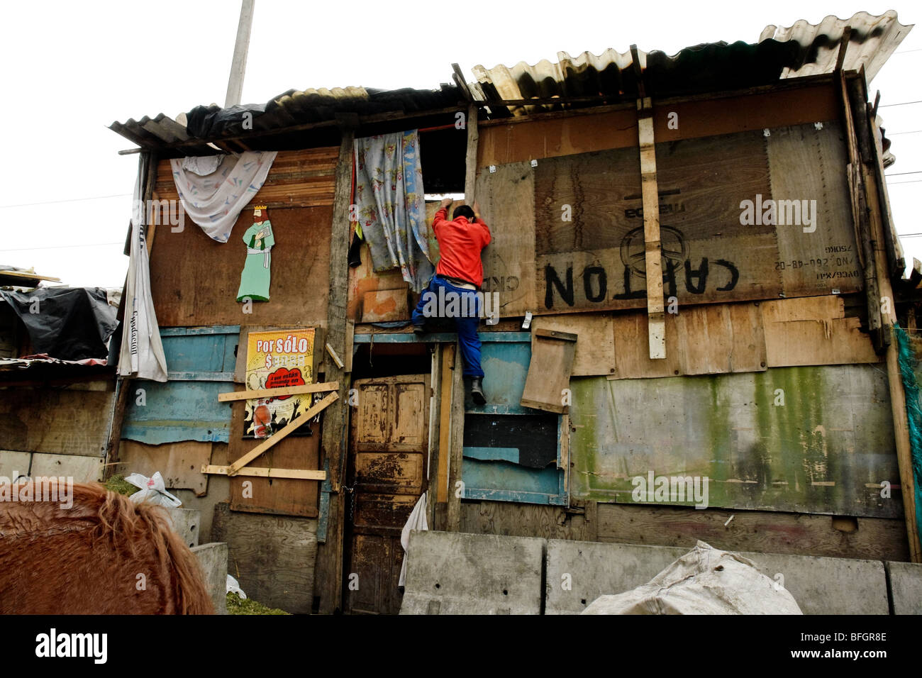 The armed conflict together with lack of social network caused appearence of illegal invasion slums in urban zones in Colombia. Stock Photo