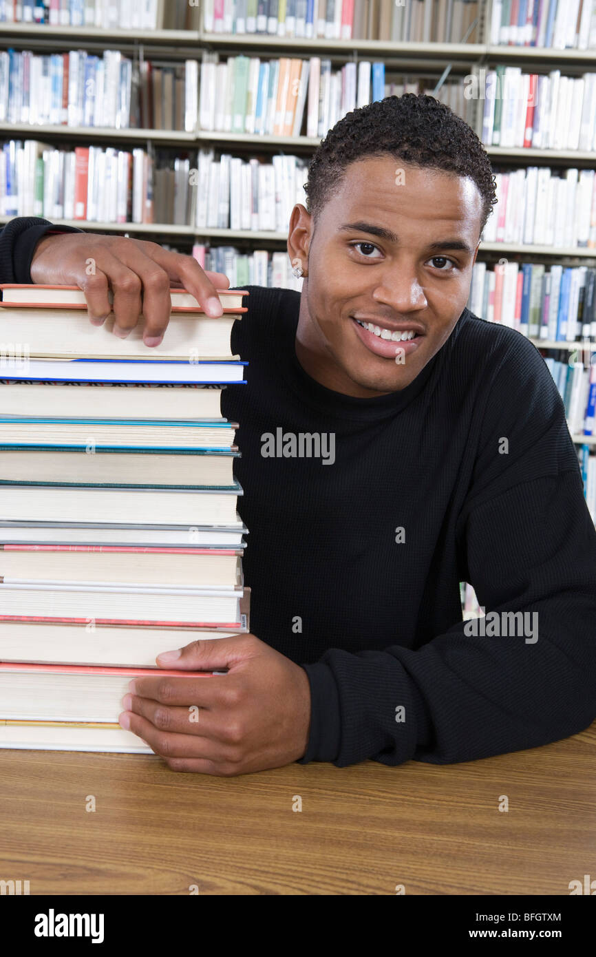 Male University student in library, portrait Stock Photo - Alamy