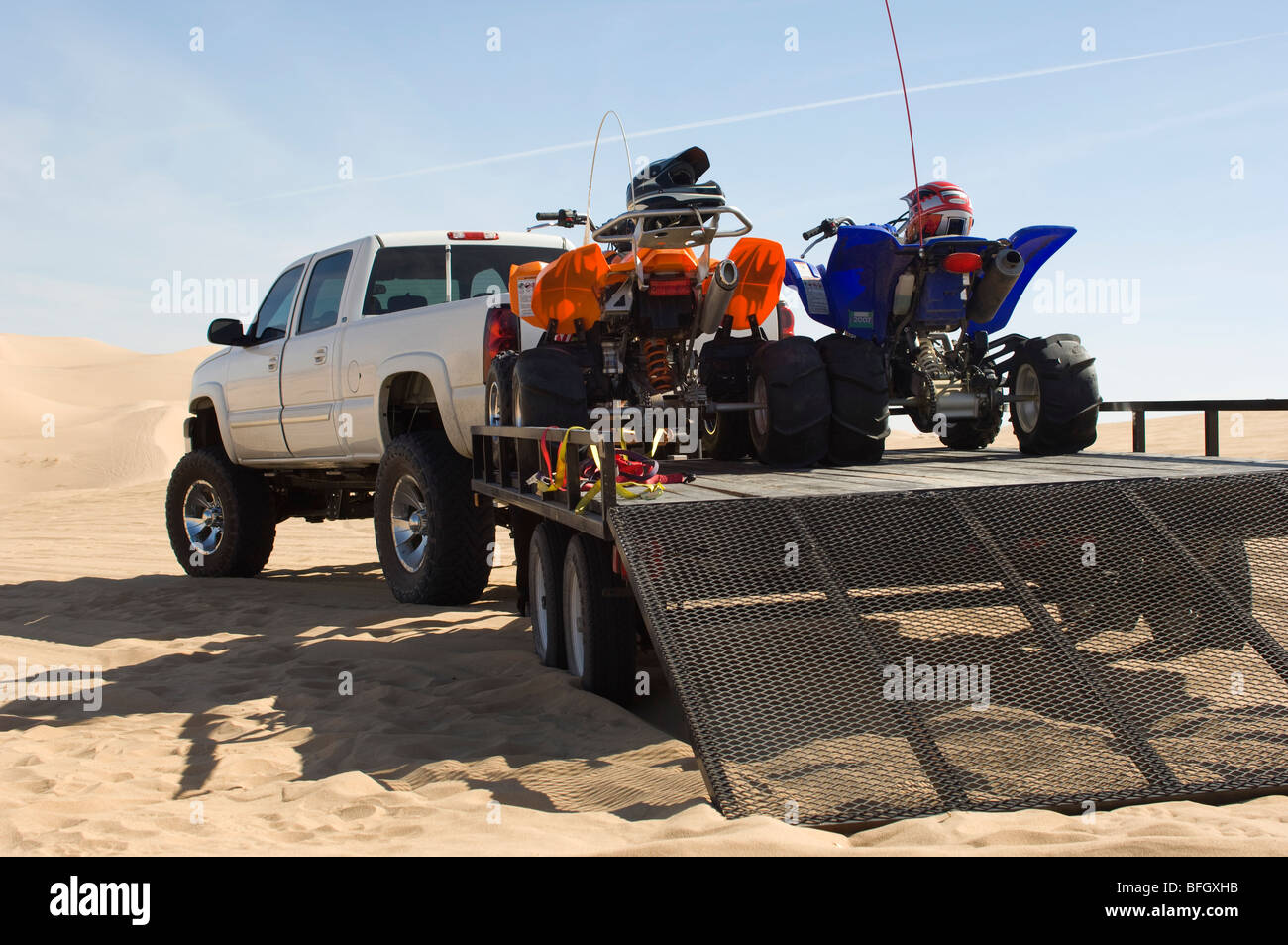 ATVs on Trailer Behind Pickup Truck Stock Photo