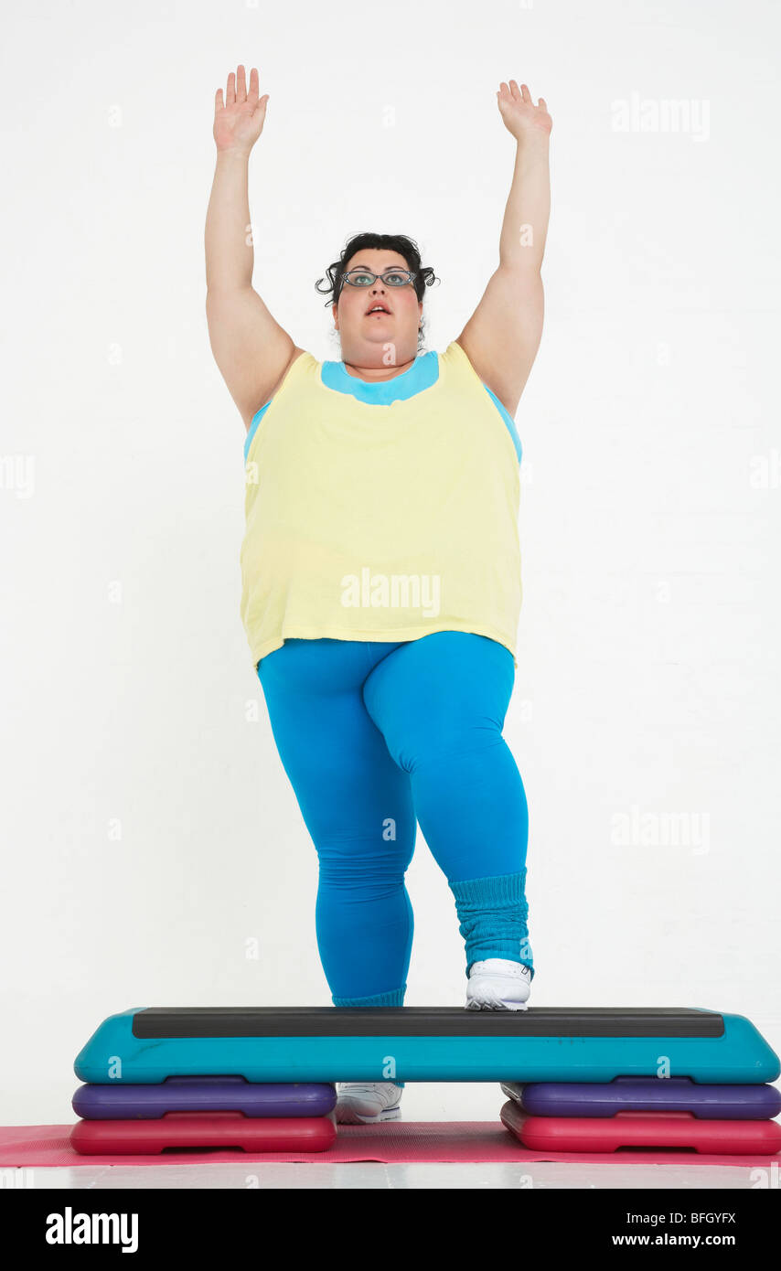 Overweight Woman Doing Gymnastics Stock Photo