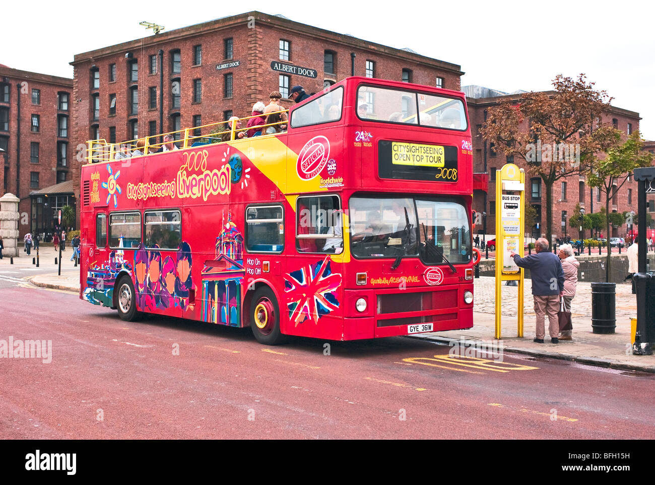 Open top sightseeing omnibus in Albert Dock Liverpool Lancashire England UK EU Stock Photo