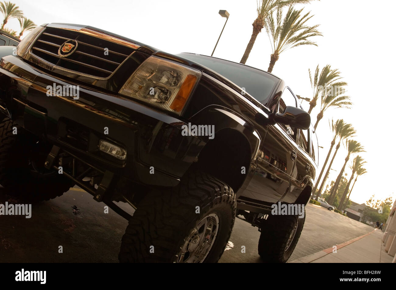 Cadillac SUV Escalade black raised Stock Photo