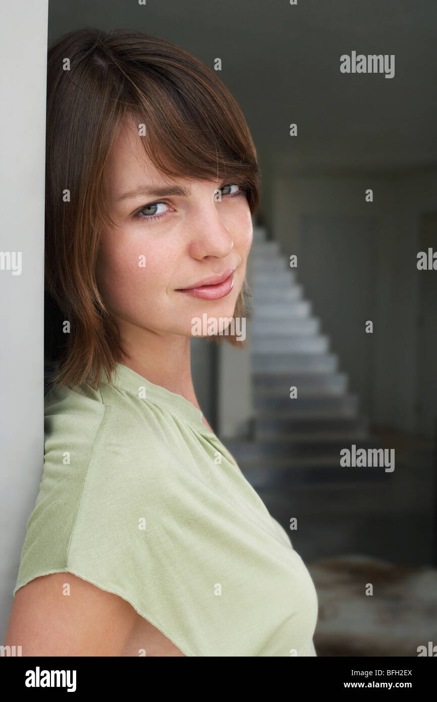 Woman posing in doorway hi-res stock photography and images - Alamy