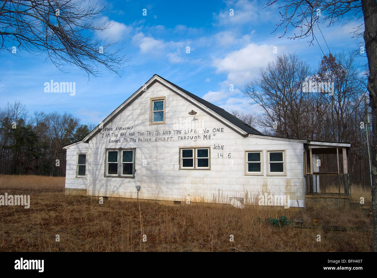 Abandoned Rural House With Bible Verse On It Stock Photo - Alamy