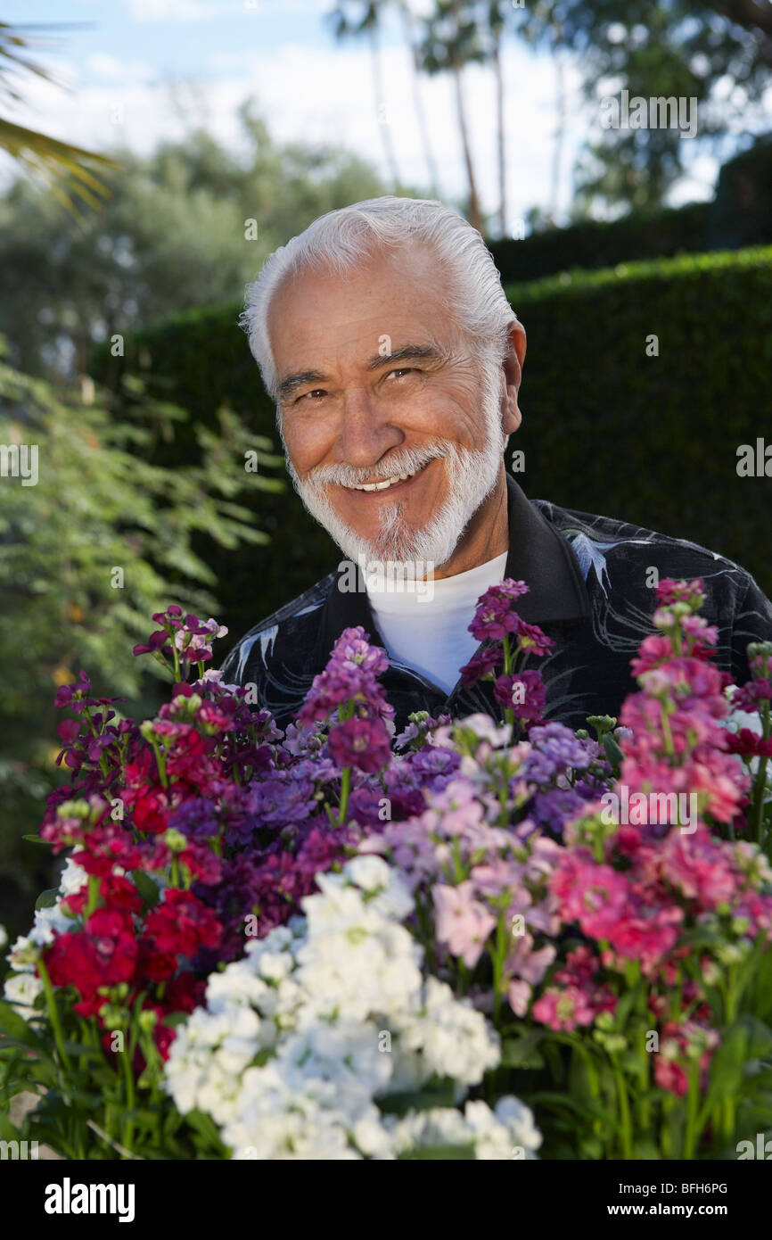 Portrait of elderly man in garden Stock Photo - Alamy