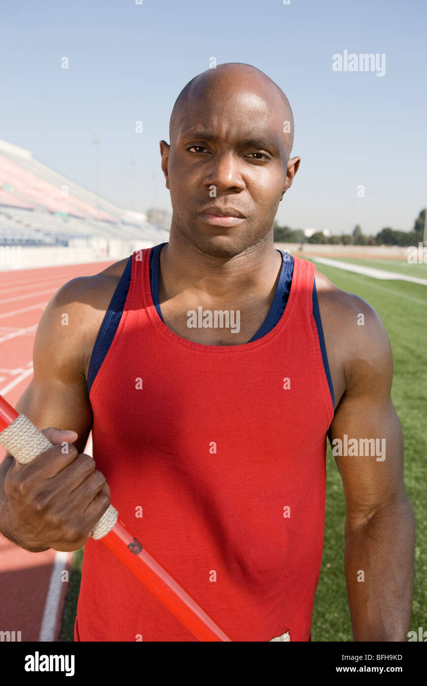 Athlete holding javelin Stock Photo