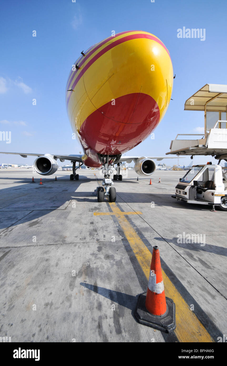 Israel, Ben-Gurion international Airport Yellow DHL cargo plane Stock Photo