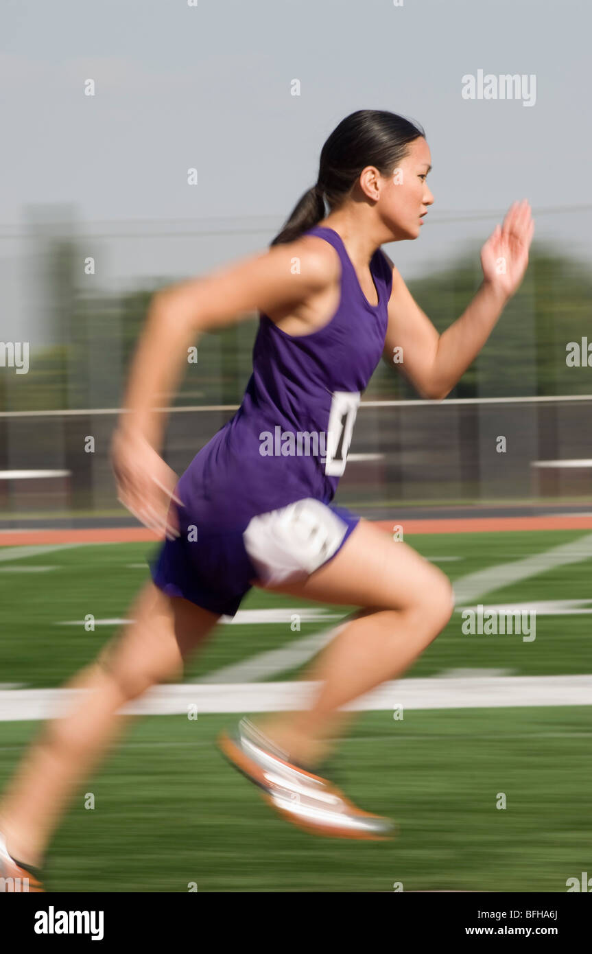 Female track athlete sprinting Stock Photo Alamy