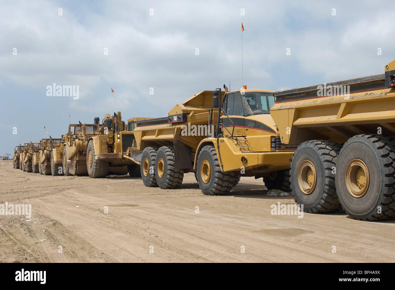 Row of trucks at landfill site Stock Photo Alamy