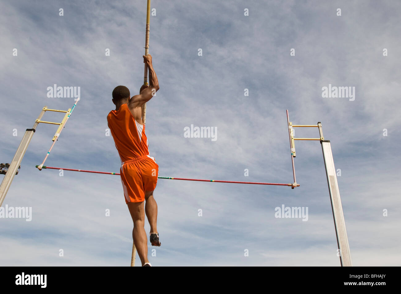 Pole vaulted taking off, low angle view Stock Photo Alamy