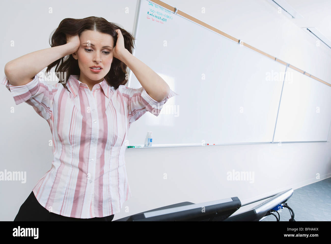 Distressed woman head in hands hi-res stock photography and images - Alamy